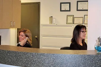 The Alex Martin, DDS staff working to schedule patient's dental appointments